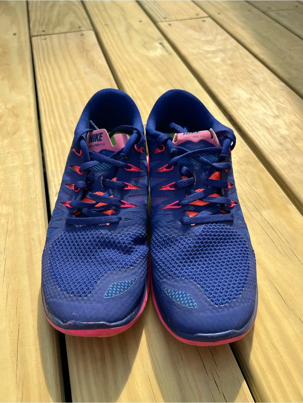 Nike Women’s Navy Blue and Hot Pink Athletic Running Shoes. Nike Free 5.0